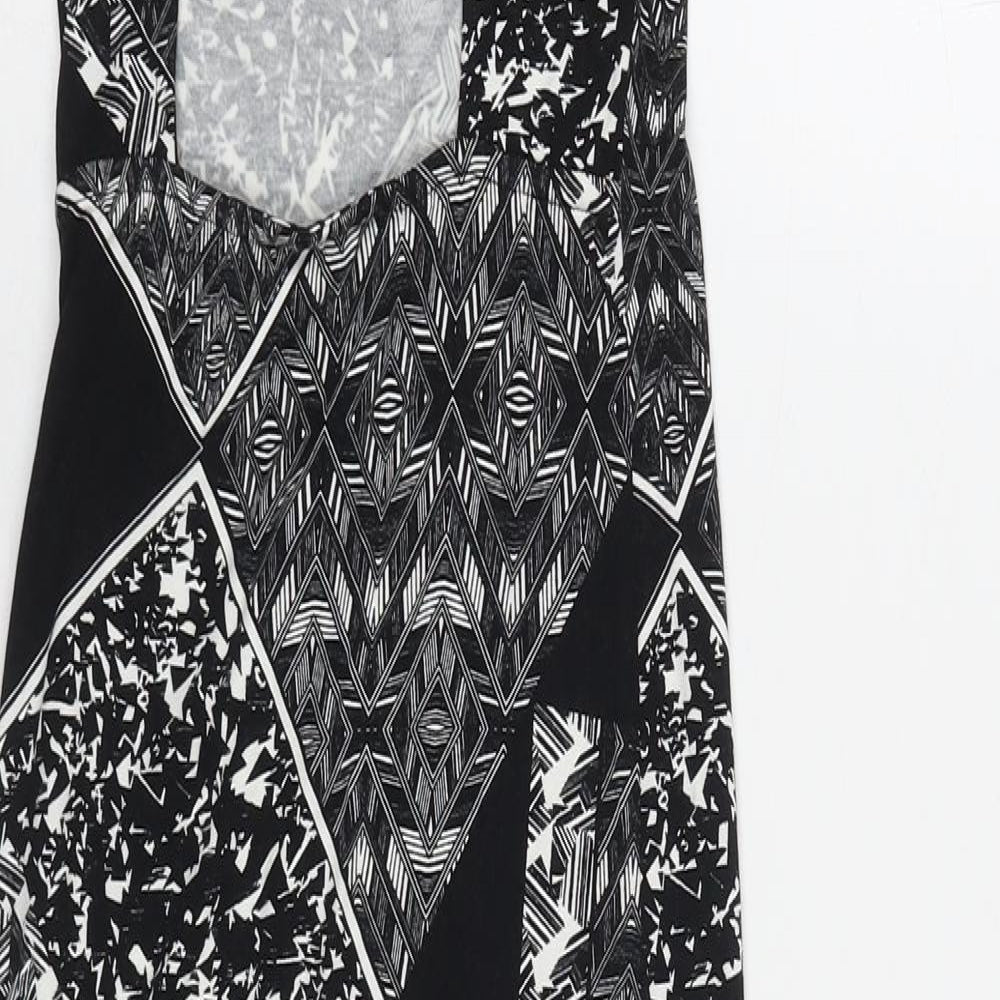 Brand and care label for Miss Selfridge women’s black geometric viscose a-line, size UK 8, square neck pullover