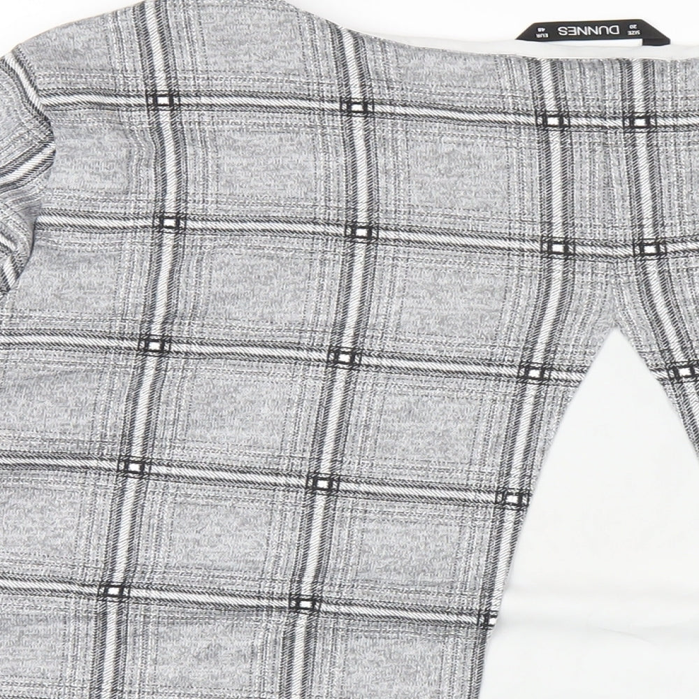 Brand and care label for Dunnes women’s grey plaid polyester basic t-shirt, size UK 20, round neck