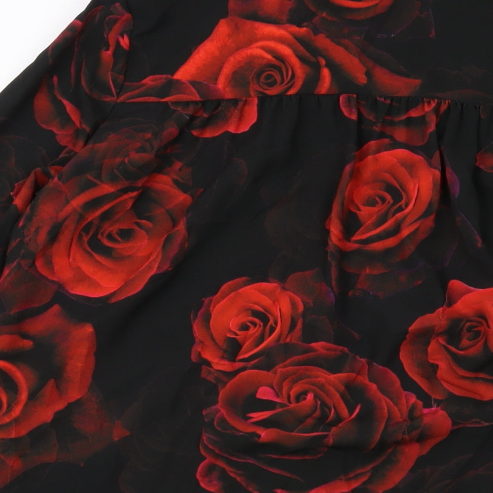 Brand and care label for Roman women’s black floral polyester basic blouse, size UK 12, collared