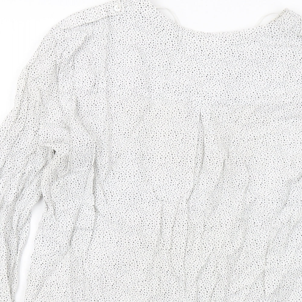 Brand and care label for ESPRIT women’s white geometric viscose basic blouse, size UK 12, v-neck