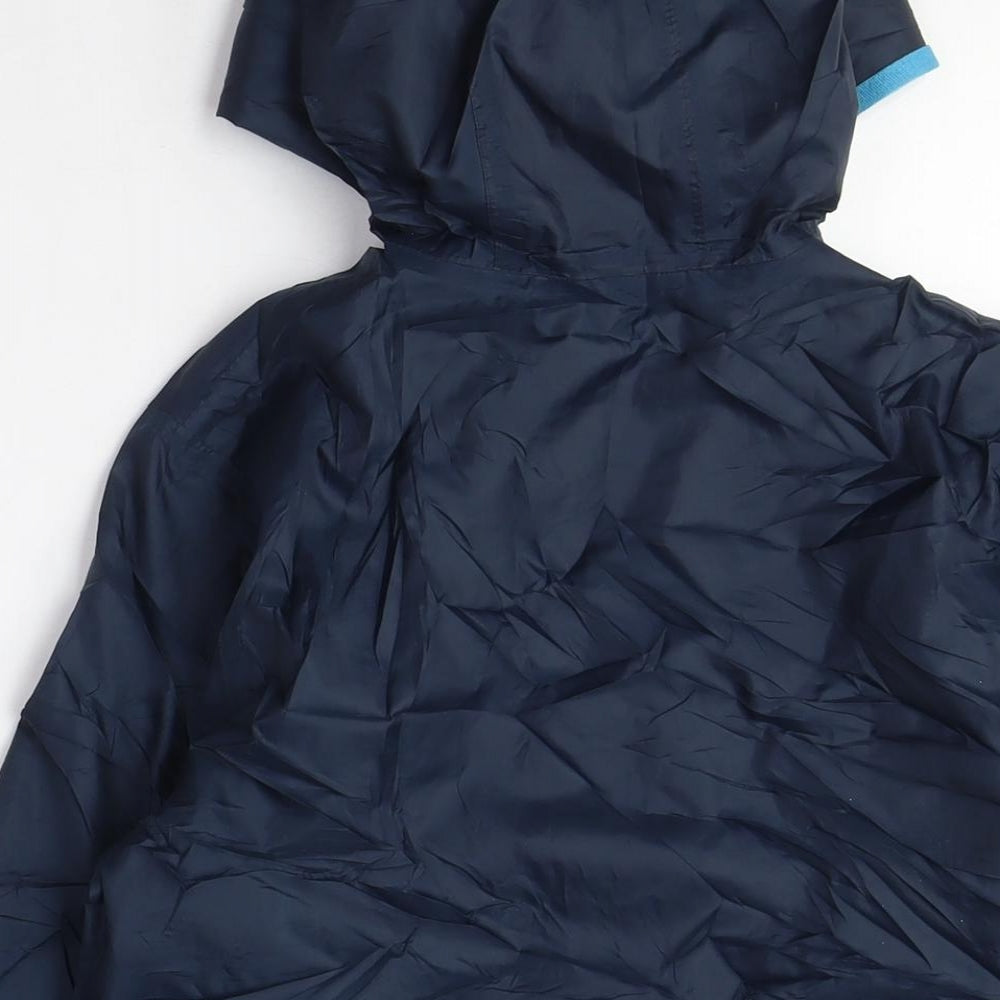 Brand and care label for Quechua boys’ black anorak coat, size 12, years zip