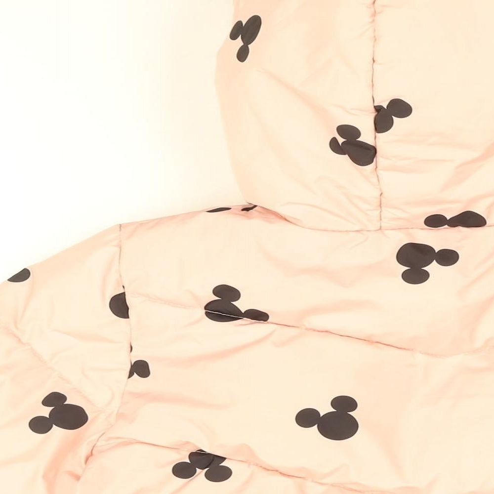 Brand and care label for Disney girls’ pink geometric puffer jacket coat, size 10-11, years zip - mickey mouse