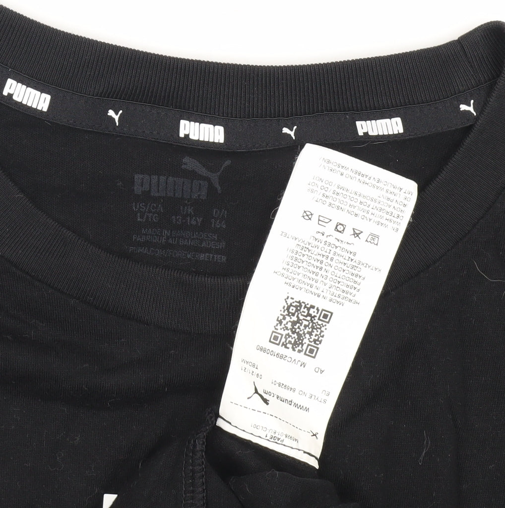 Close-up detail of Puma boys’ black t-shirt, crew neck, logo, size 13-14, years