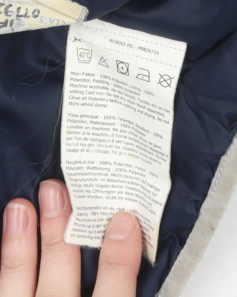 Brand and care label for Regatta boys’ blue puffer jacket 8 years geometric hooded