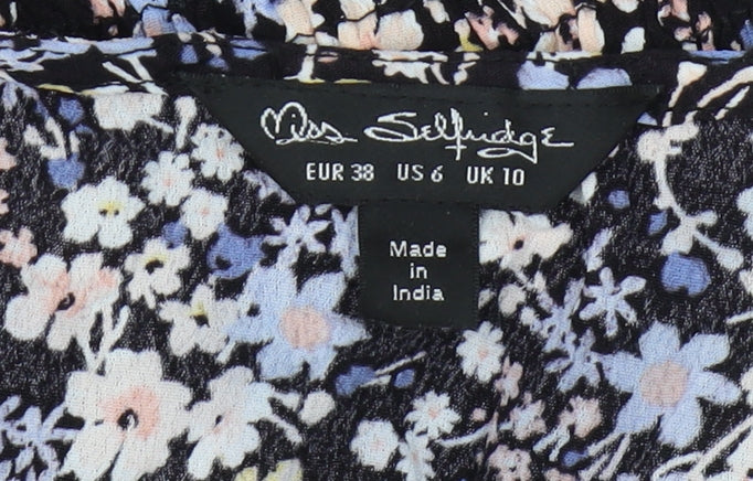 Brand and care label for Miss Selfridge Women's Floral Cropped Blouse, size 10
