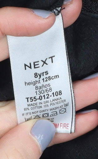 Close-up detail of Next girls’ black graphic sequin sweatshirt 8 years