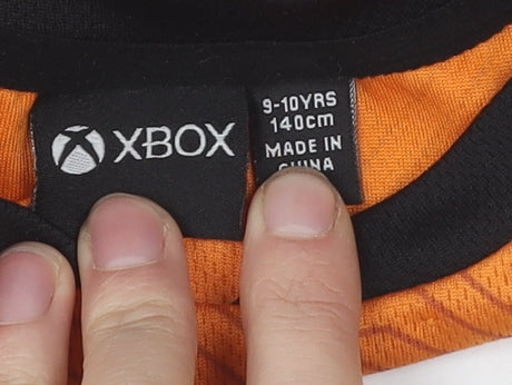 Brand and care label for XBOX boys’ orange graphic t-shirt, 10 years, game theme