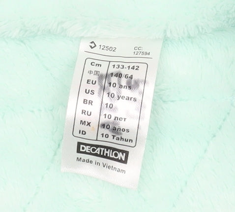 Close-up detail of Decathlon girls’ blue puffer jacket 10 years winter coat