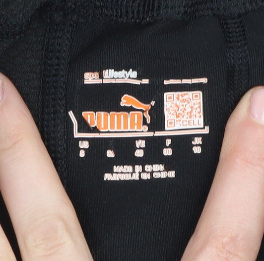 Brand and care label for Puma Women's Black Gym Leggings, size 12, Elastic Waist