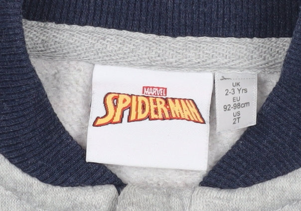 Brand and care label for Spider-Man boys’ blue varsity jacket 2-3 years - superhero style