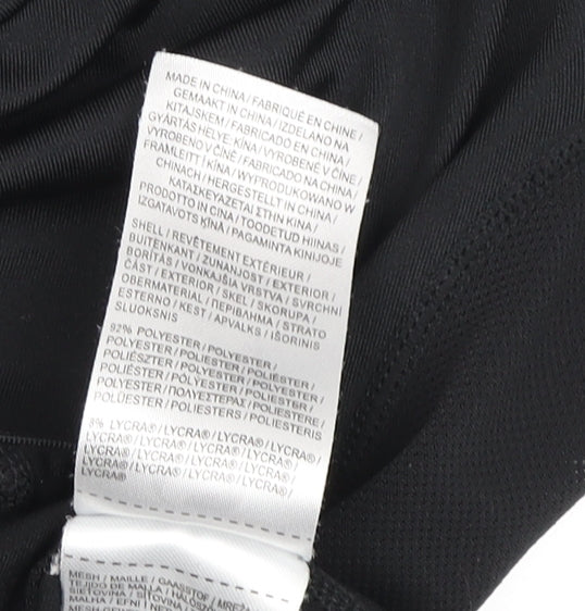 Brand and care label for Sondico boys’ black long sleeve active top 10 years