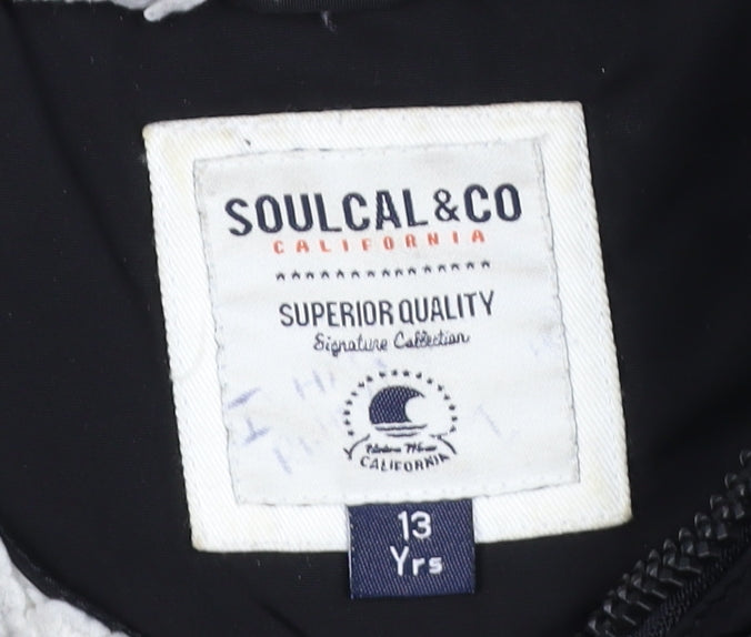 Brand and care label for SoulCal boys’ black puffer jacket 13 years