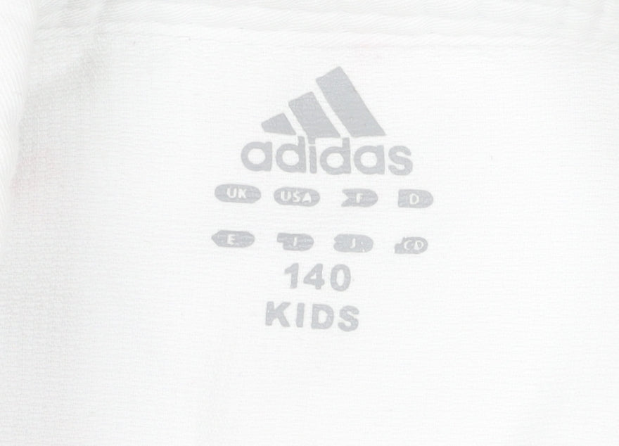 Brand and care label for Adidas boys’ white track jacket 11 years cotton blend