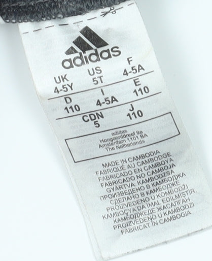 Brand and care label for Adidas girls’ grey ankle leggings, size 4-5y elastic waist