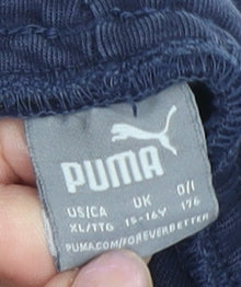 Close-up detail of Puma boys’ blue athletic shorts xl