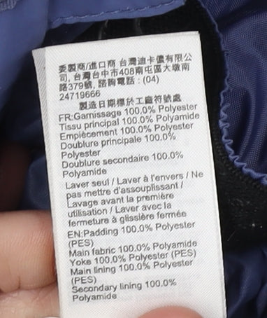 Brand and care label for Decathlon girls’' blue parka jacket 3-4 years waterproof
