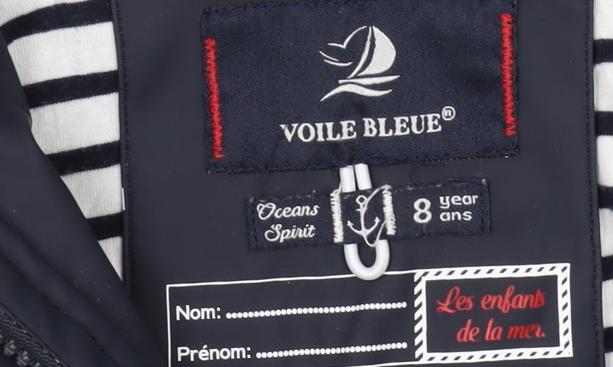 Brand and care label for Voile Bleue boys’ blue hooded jacket, 8 years