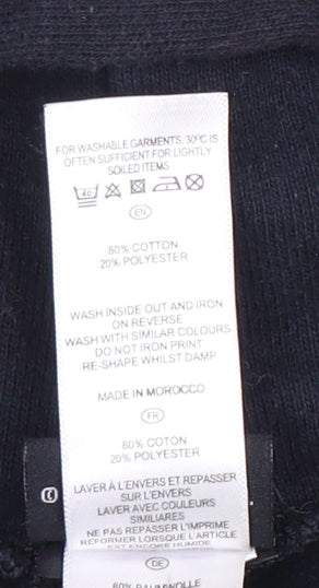 Brand and care label for Star Wars boys’ black pullover hoodie 14-16 years