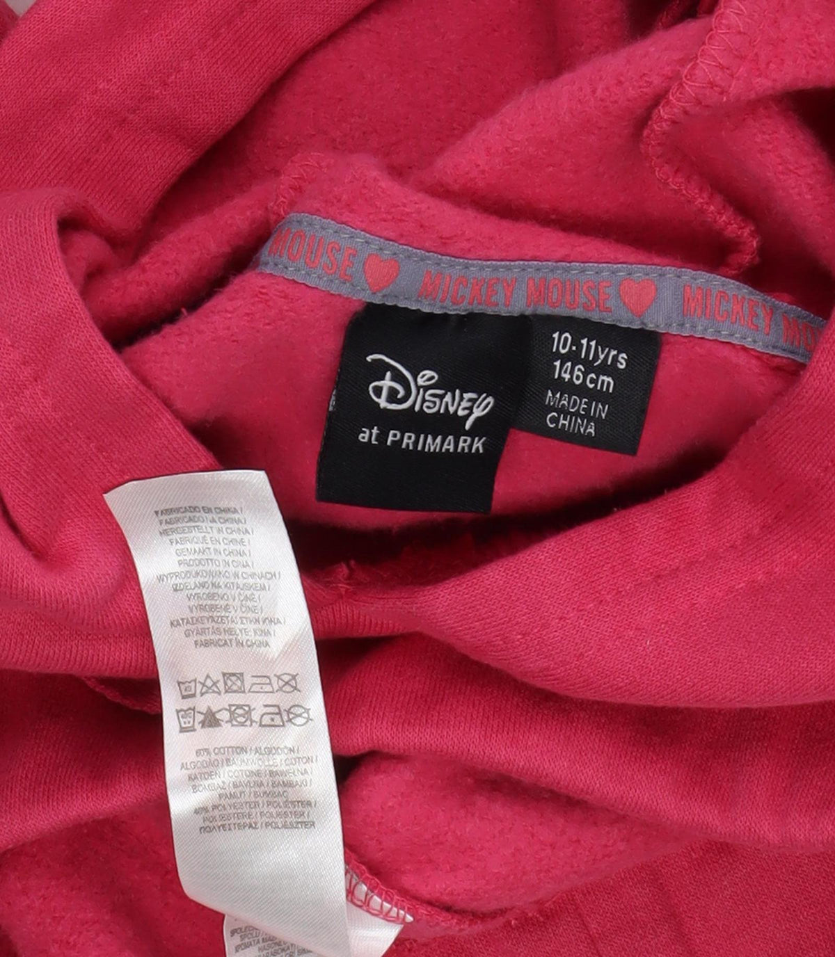 Close-up detail of Disney girls’ red mickey mouse hoodie pullover 11 years casual fun