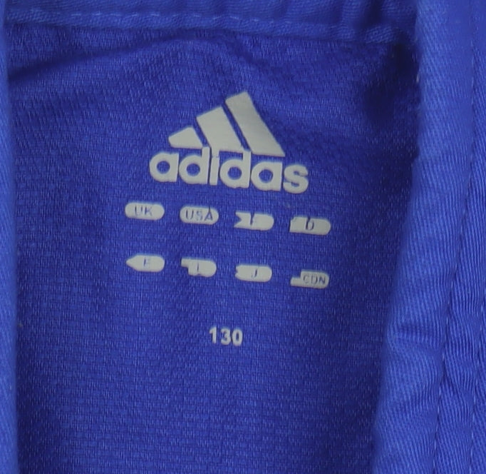 Brand and care label for Adidas boys’ blue jacket 9-10 years activewear