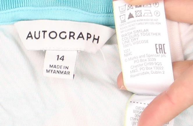 Close-up detail of Autograph Women's Geometric Top, size 14, Short Sleeve