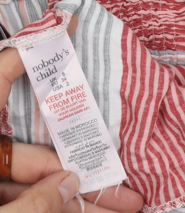 Brand and care label for Nobody's Child Women's Striped Off Shoulder Top