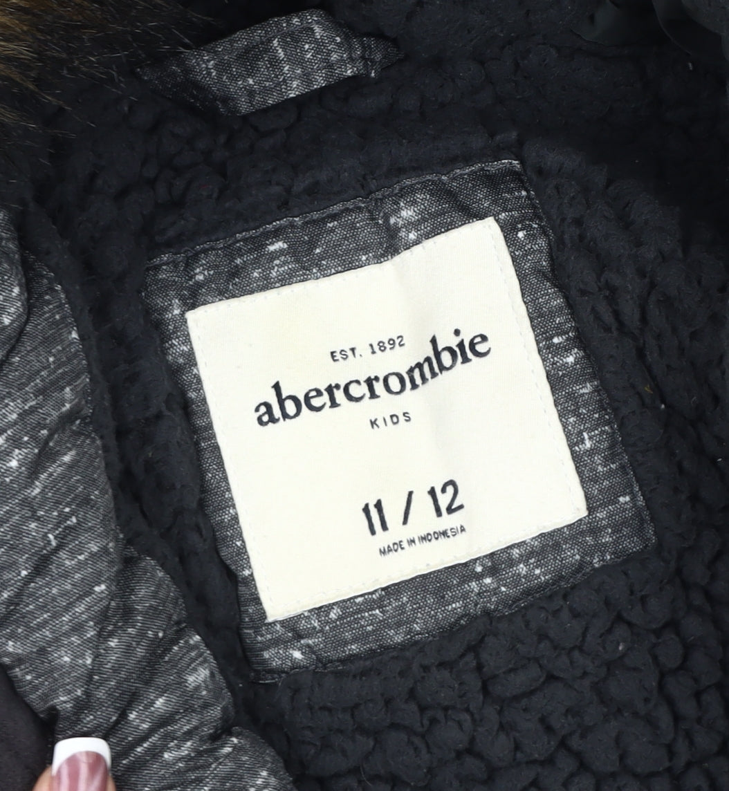 Close-up detail of Abercrombie & Fitch boys’ grey puffer jacket 11-12 years winter hooded