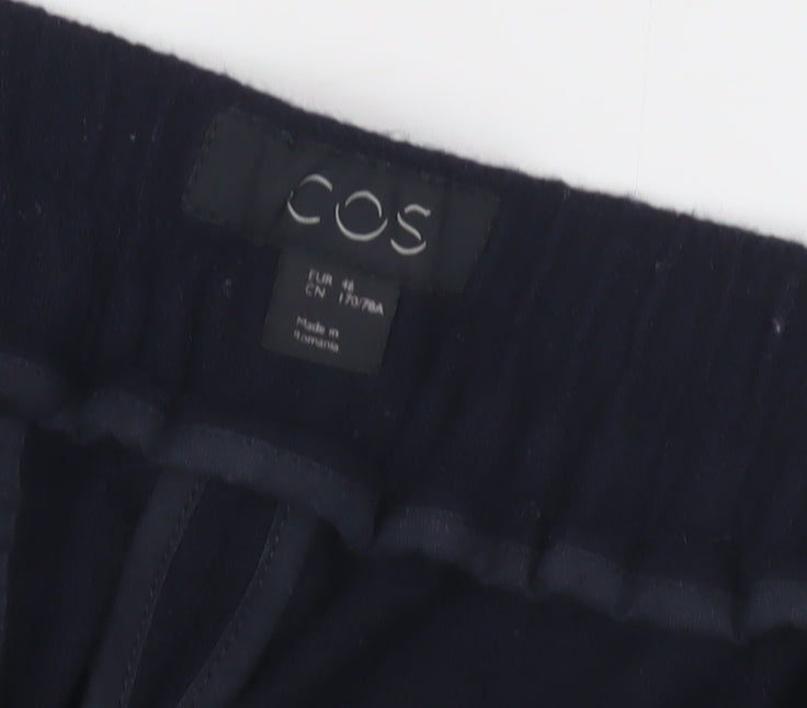 Brand and care label for COS Women's Black Wool Trousers, size 4