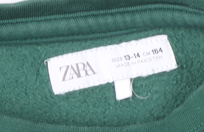 Brand and care label for Zara boys’ green graphic print sweatshirt 13-14 years