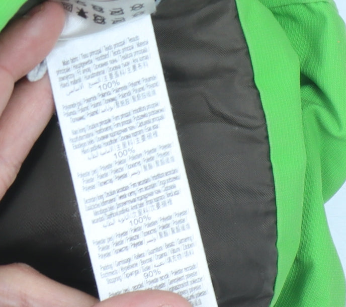 Brand and care label for Quechua boys’ green hooded puffer jacket, size 10-11, years