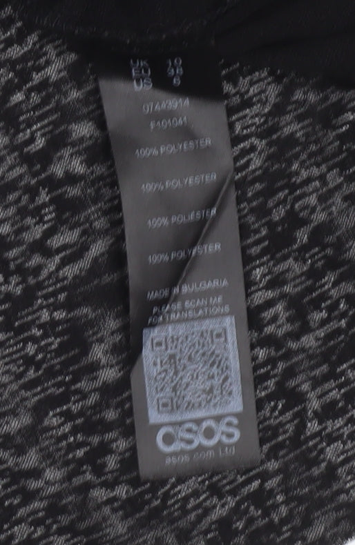 Brand and care label for ASOS Women’s Black Off Shoulder Bell Sleeve Tunic Blouse, size UK 10