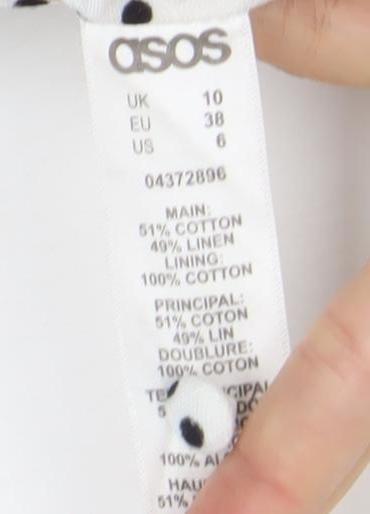 Brand and care label for ASOS Women’s White Polka Dot Asymmetric Slip Dress, size UK 10