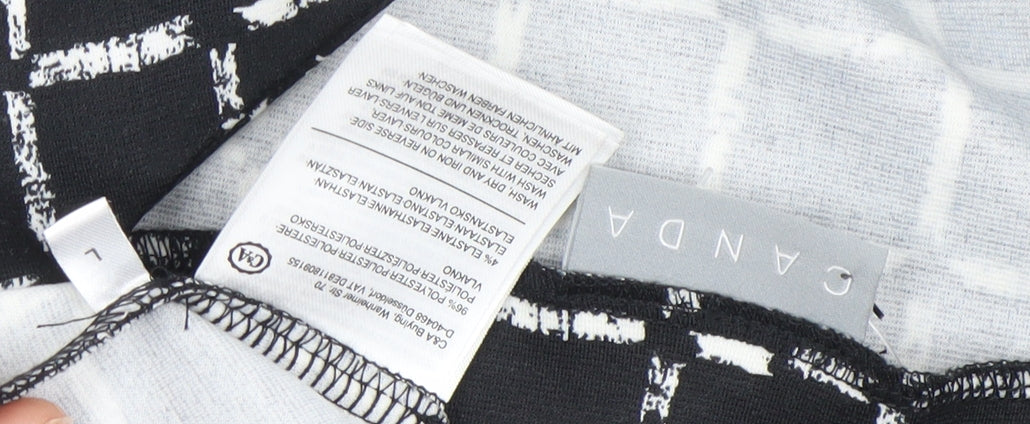 Brand and care label for Canda Women Black Check Tunic Blouse L Boat Neck Short Sleeve