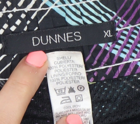 Brand and care label for Dunnes Men’s Black Check XL Board Shorts Swimwear Quick Dry