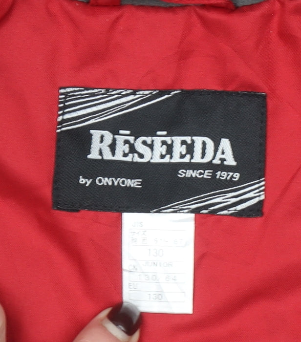 Brand and care label for Reseeda boys’ red varsity jacket hooded lined water resistant 10 years