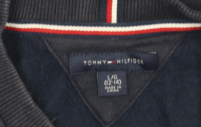 Brand and care label for Tommy Hilfiger boys’ blue logo pullover sweatshirt 12-14 years