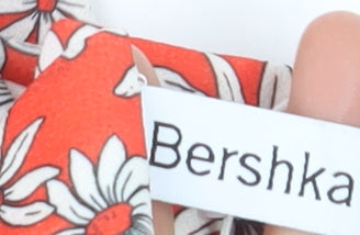 Bershka Women's Orange Floral Flared Trousers XS