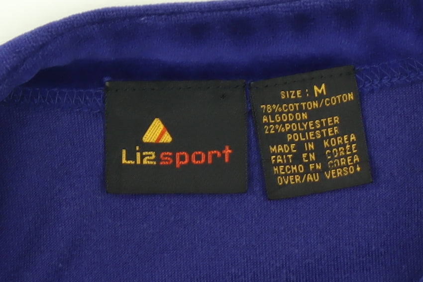 Brand and care label for Lizsport Women's Purple Velour Pullover Sweatshirt Medium