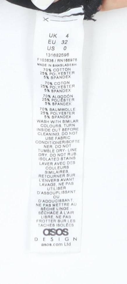 Brand and care label for ASOS DESIGN Women's Black Cotton Blend Zip Front Long Sleeve Jumpsuit, size 4