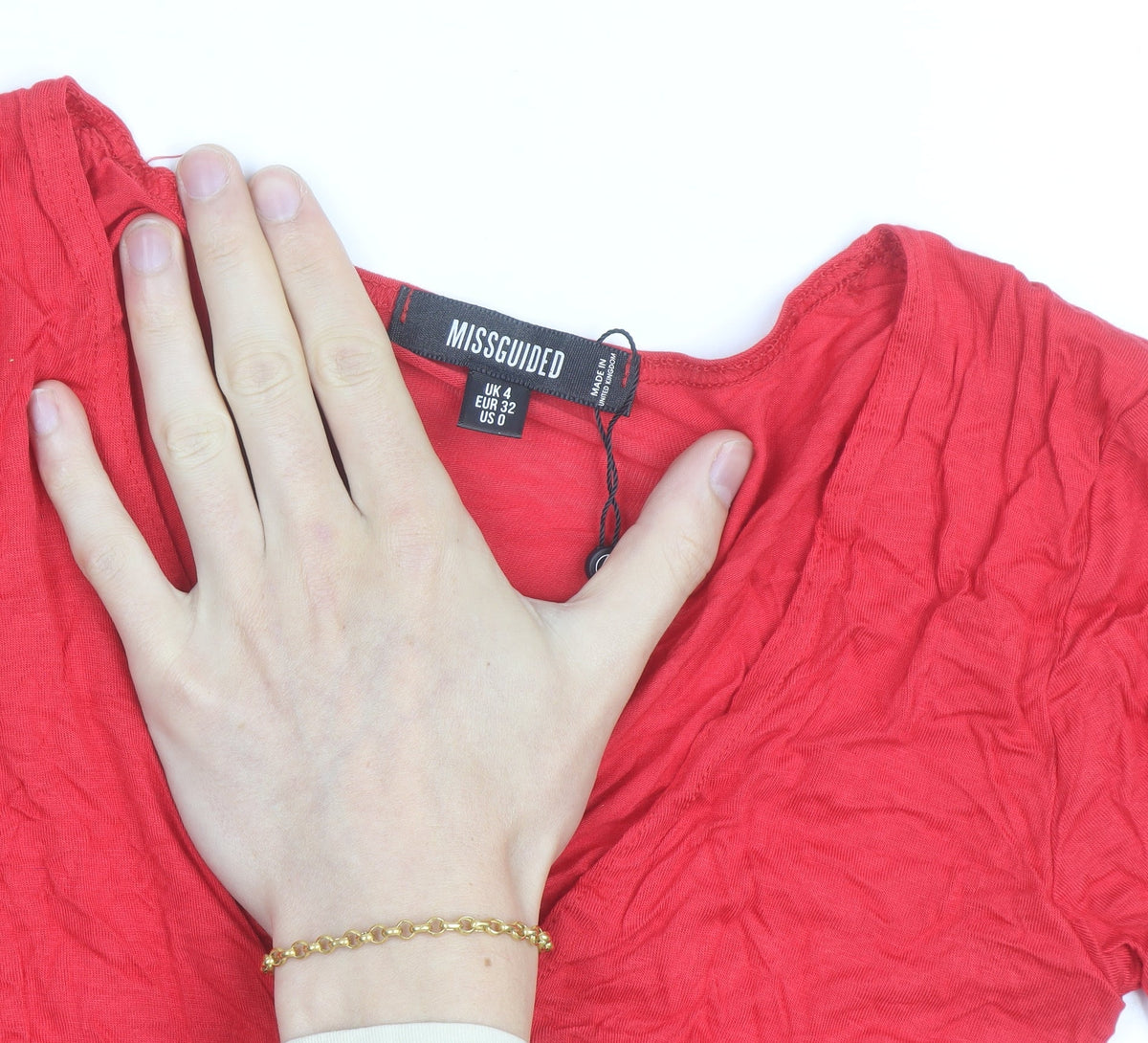 Brand and care label for Missguided women’s red wrap tie blouse uk 4 v-neck short sleeve top