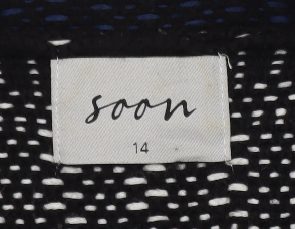 Brand and care label for Soon women’s black geometric knit open cardigan, size UK 14