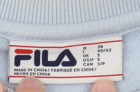 Brand and care label for Fila Women's Light Blue Crew Neck Pullover Sweatshirt, size S