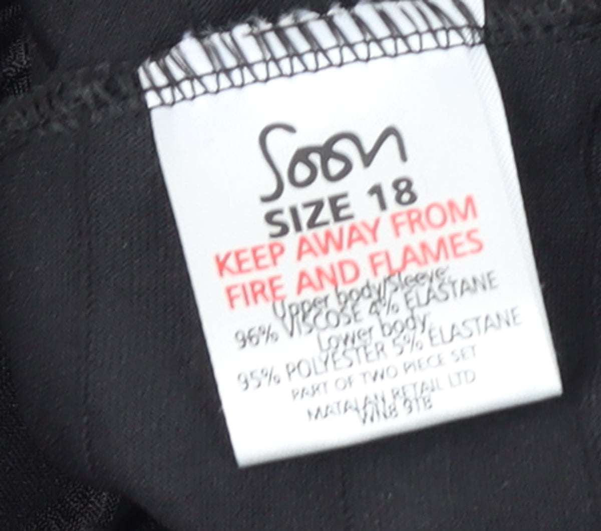 Brand and care label for Soon Women Black 3/4 Sleeve Ruffle Tunic Top, size 18