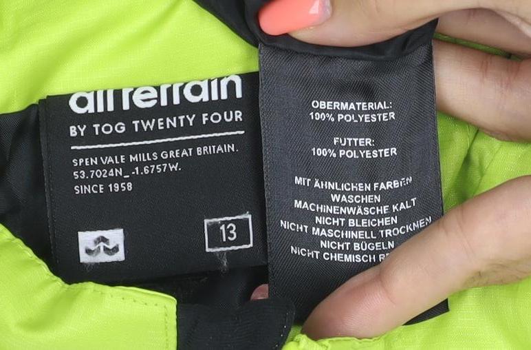 Brand and care label for All Terrain boys’ green 13 years hooded ski jacket full zip
