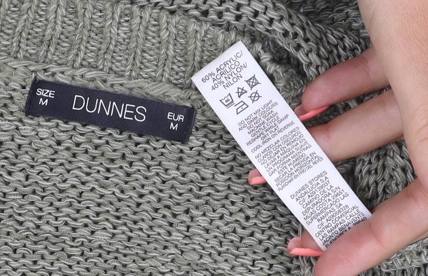 Brand and care label for Dunnes Women Green M V-Neck Chunky Knit Raglan Sleeve Jumper