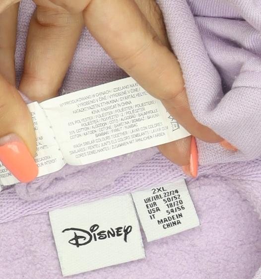 Brand and care label for Disney Women’s Purple XS Stitch Graphic Pullover Sweatshirt Crew Neck