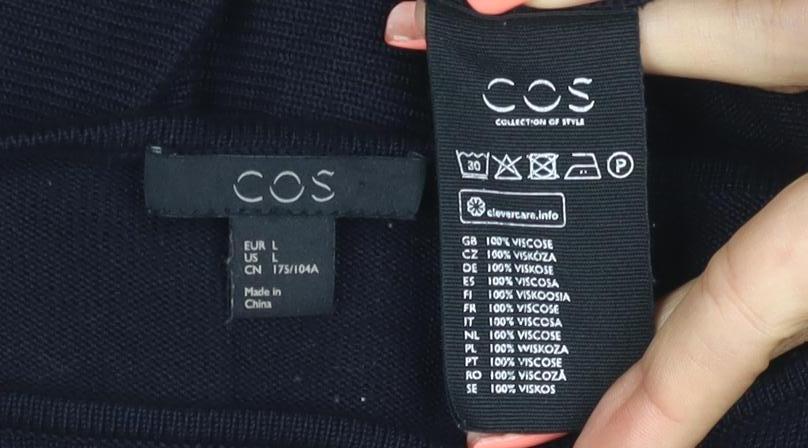 Brand and care label for COS Women Black L Viscose Knit Tunic Top 3/4 Raglan Sleeve