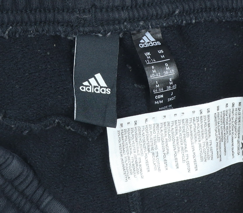 Brand and care label for Adidas Women’s Black UK 12-14 M Jogger Track Pants Striped Fleece