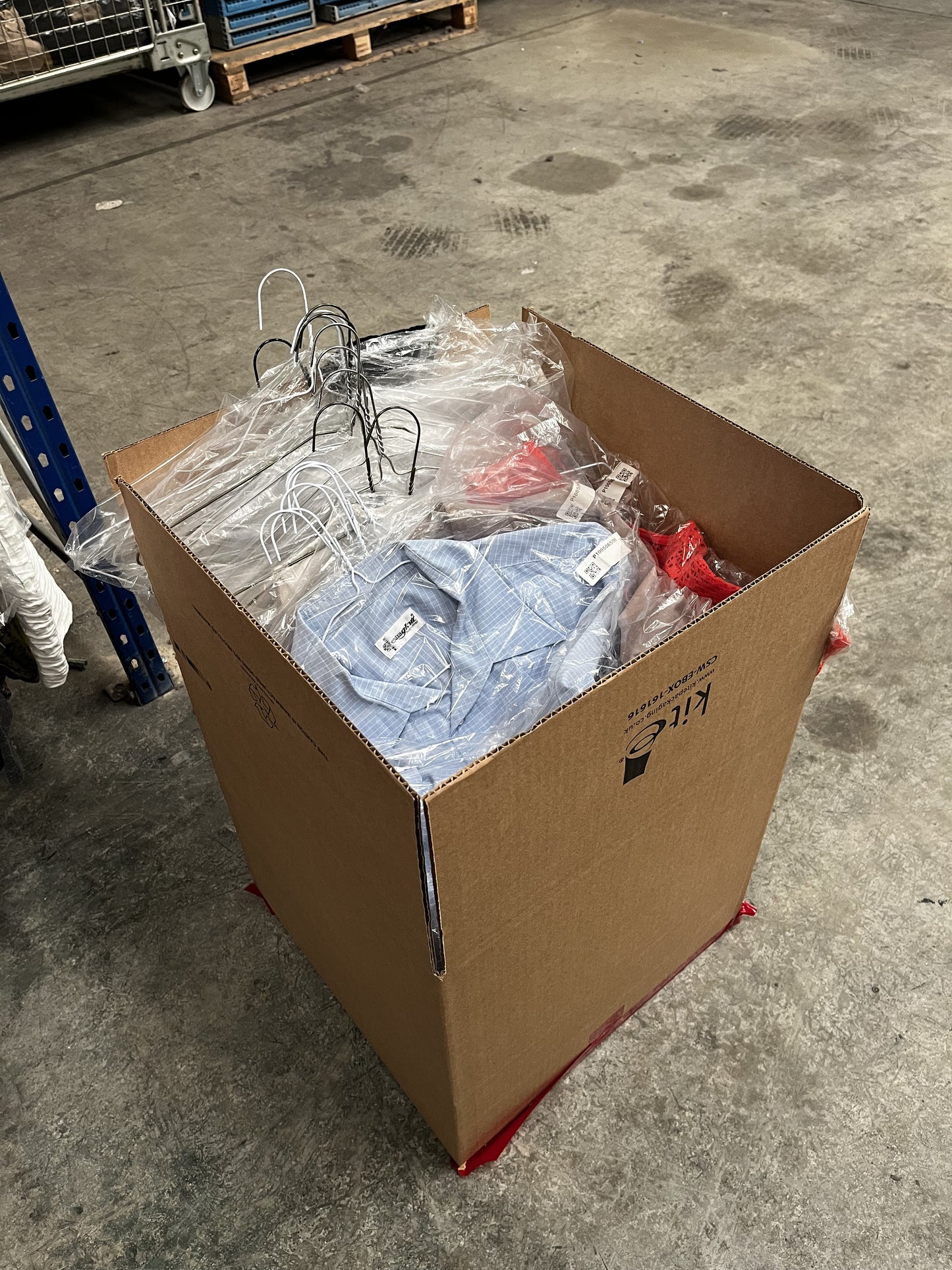 Wholesale Lot of Second-Hand Clothes with Hangers