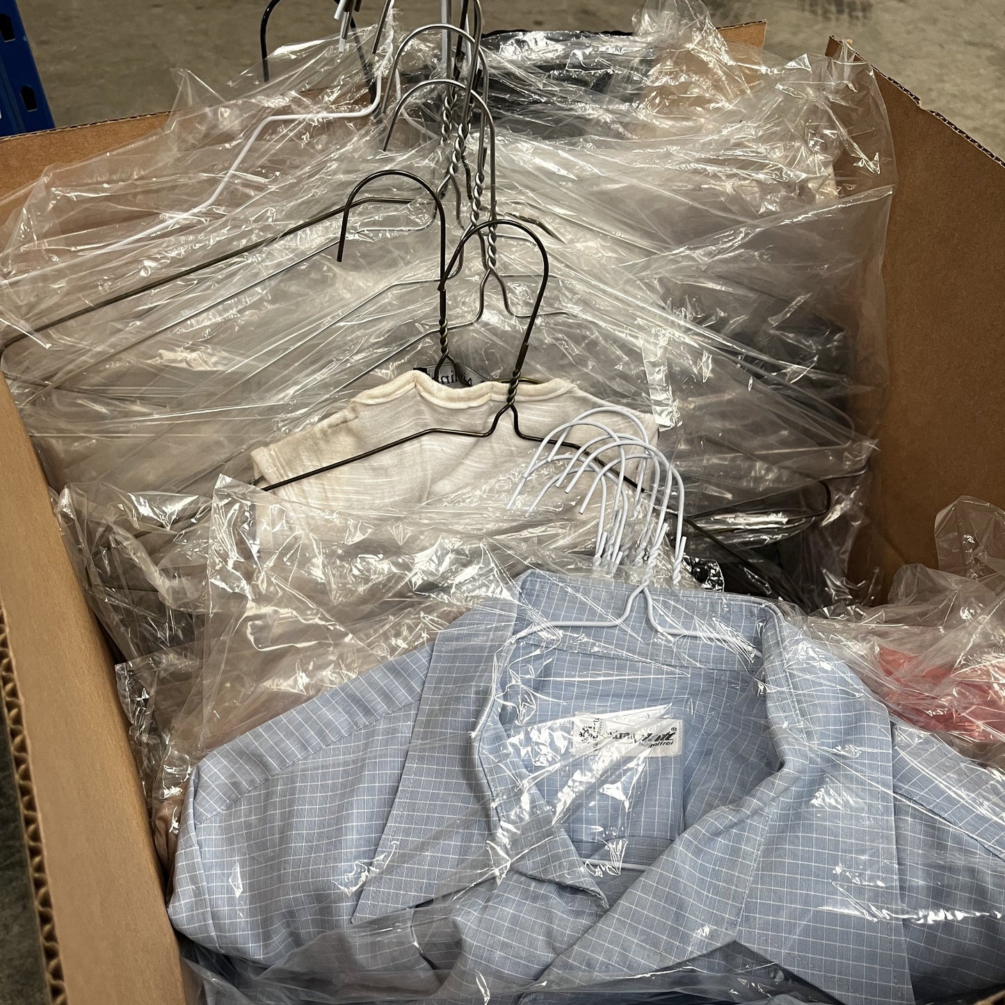 Wholesale Lot of Second-Hand Clothes with Hangers